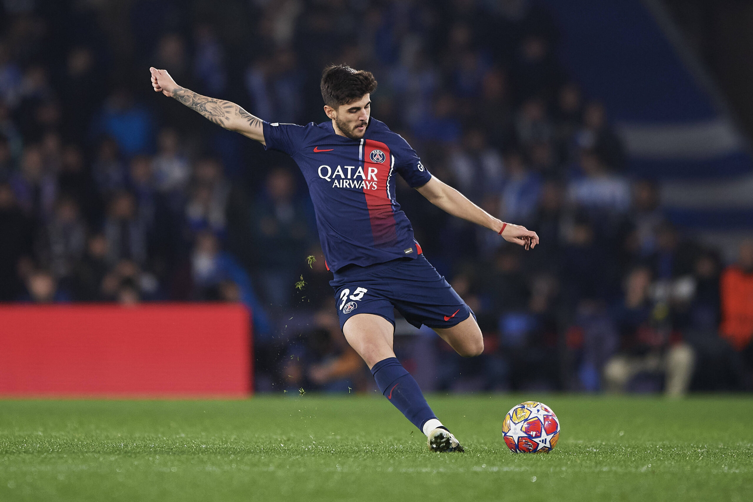 Lucas Beraldo of Paris Saint Germainruns with the ball during the UEFA Champions League match between Real Sociedad v Pa